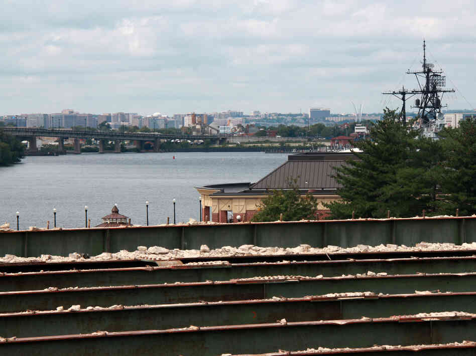 The concrete atop the old bridge has been stripped off. The proposed park would offer impressive views.