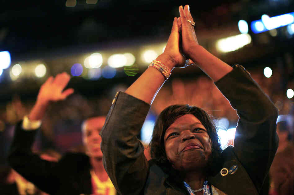 Delegates cheer during the first session of the convention.