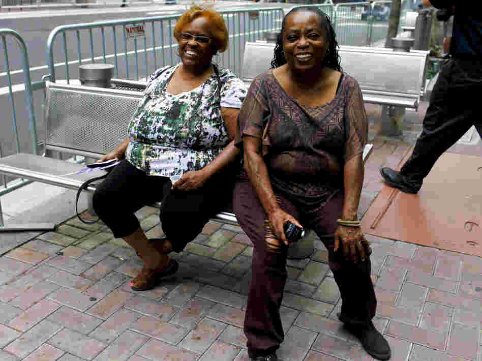 Creola Boswell (left) and her sister Susie Collins flew to Charlotte from California to enjoy the convention atmosphere.