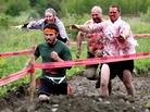A runner tries to escape with his life as zombies pursue him during the Run for Your Lives race. The 5K course is littered with obstacles — and the undead. A runner tries to escape with his life as zombies pursue him during the Run for Your Lives race. The 5K course is littered with obstacles — and the undead.