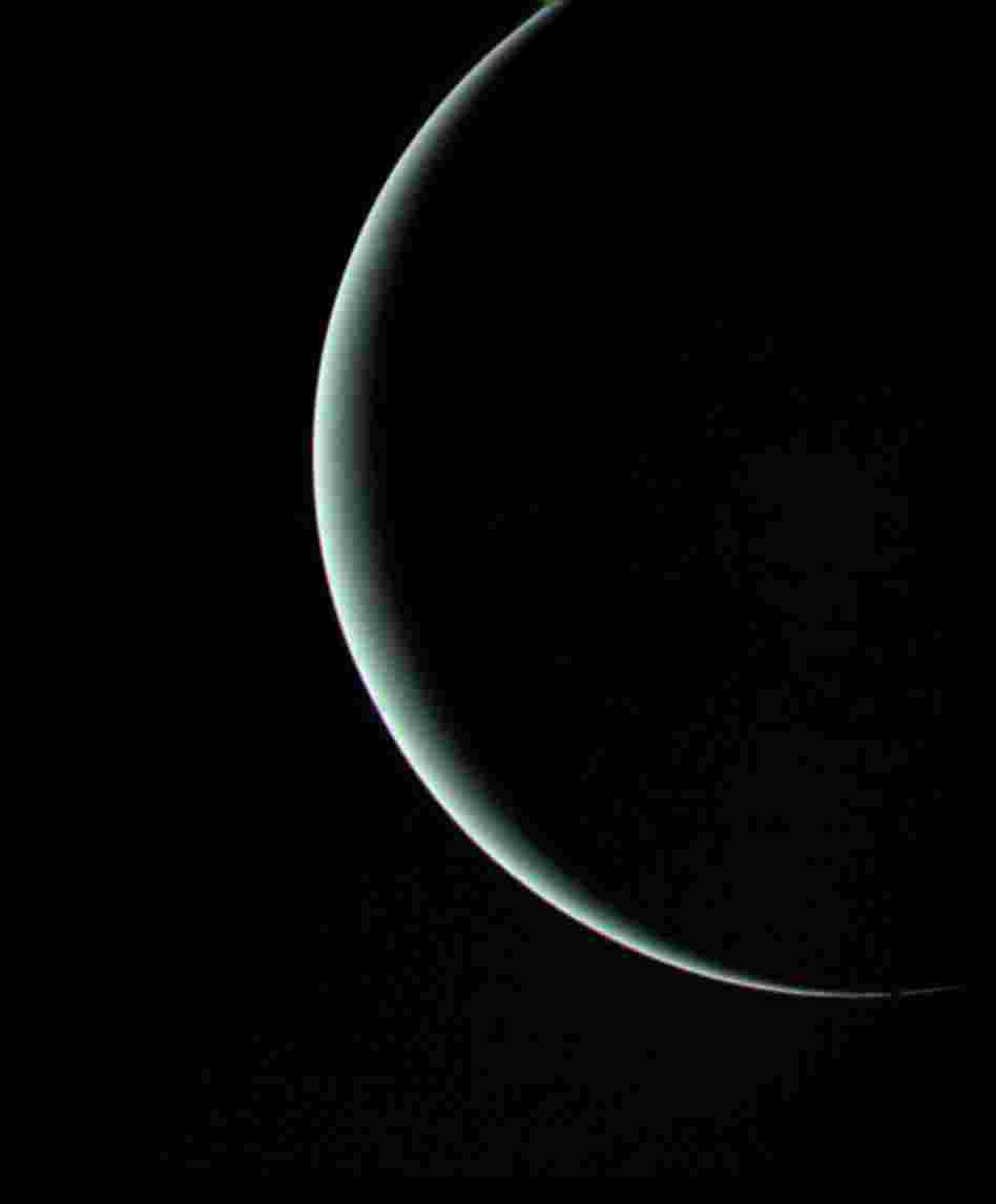 After the Voyager craft surveyed Jupiter and Saturn, NASA extended their mission and sent Voyager 2 on to Uranus and Neptune. Voyager 1 kept traveling outward. This image of Uranus was captured by Voyager 2 in 1986, when it was about 600,000 miles from the planet. Uranus' pale blue-green color is a result of methane in the atmosphere.