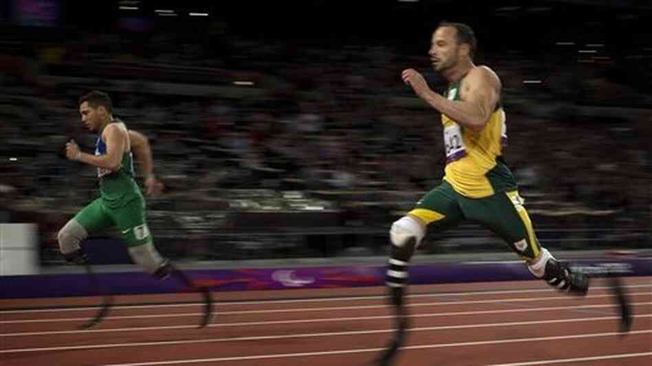 In a surprise finish, Brazil's Alan Fonteles Cardoso Oliveira (left) races past South Africa's Oscar Pistorius to win a gold medal in the 200-meter race at the 2012 London Paralympic Games. In a surprise finish, Brazil's Alan Fonteles Cardoso Oliveira (left) races past South Africa's Oscar Pistorius to win a gold medal in the 200-meter race at the 2012 London Paralympic Games.