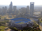 The skyline of Charlotte, N.C., rises behind Bank of America Stadium. The skyline of Charlotte, N.C., rises behind Bank of America Stadium.