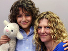 Graham Haggett, 11, and his mother, Shelli Wright, remembered Graham's grandmother Sandra Lee Wright, who was killed in the World Trade Center attacks. Graham brought "Lammy," a stuffed animal his grandmother gave him, to the interview. Graham Haggett, 11, and his mother, Shelli Wright, remembered Graham's grandmother Sandra Lee Wright, who was killed in the World Trade Center attacks. Graham brought "Lammy," a stuffed animal his grandmother gave him, to the interview.