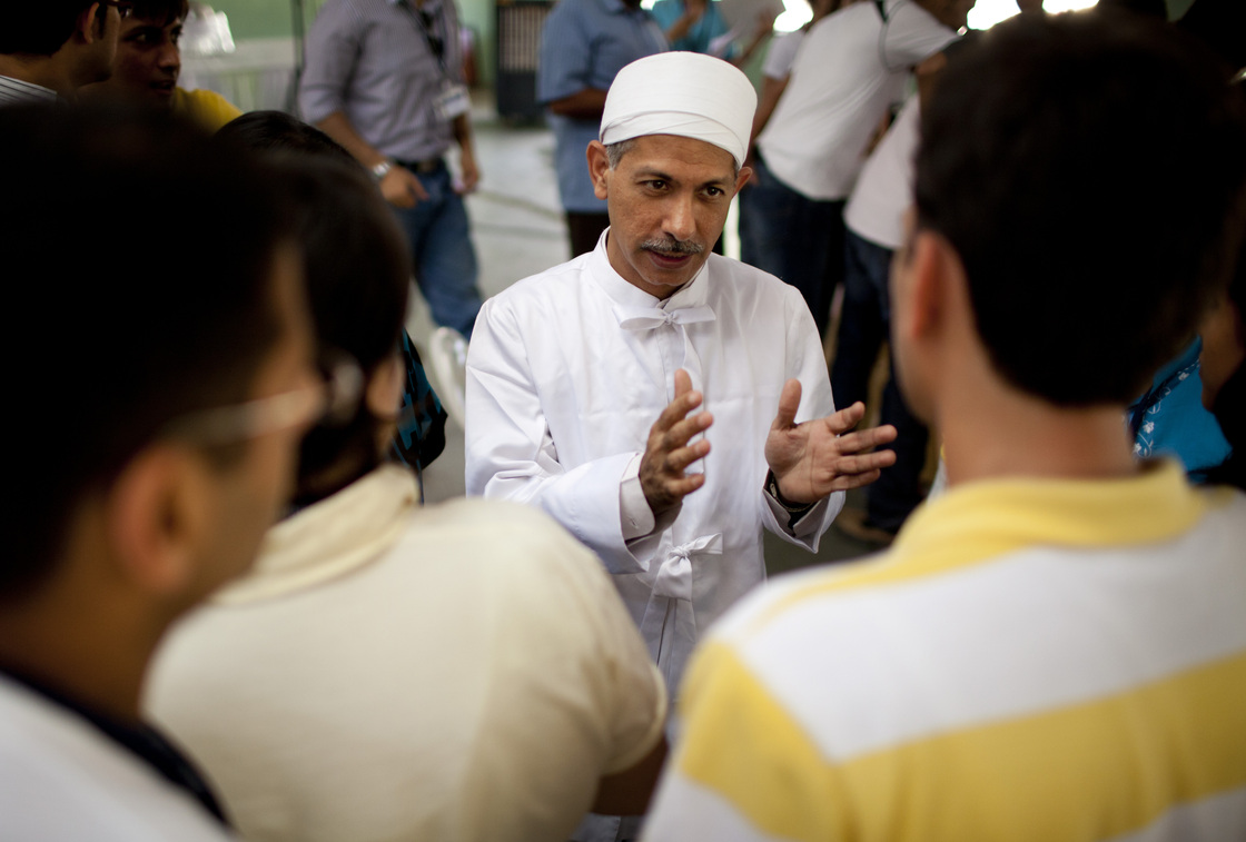 Zoroastrian priest Ramiyar Karanjia fields questions during a meeting with young members of the faith in Pune, India, on May 13, 2010.