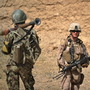 A U.S. Marine (right) and an Afghan National Army soldier on patrol this summer in Afghanistan's Helmand Province. A U.S. Marine (right) and an Afghan National Army soldier on patrol this summer in Afghanistan's Helmand Province.