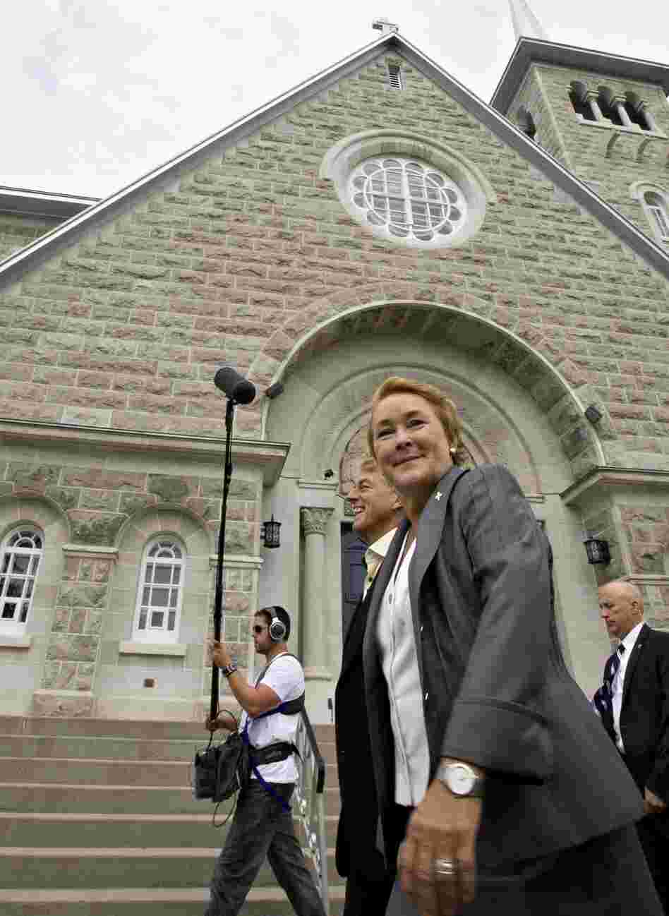 Pauline Marois and her husband in Quebec City, after casting their votes in Tuesday's provincial election.