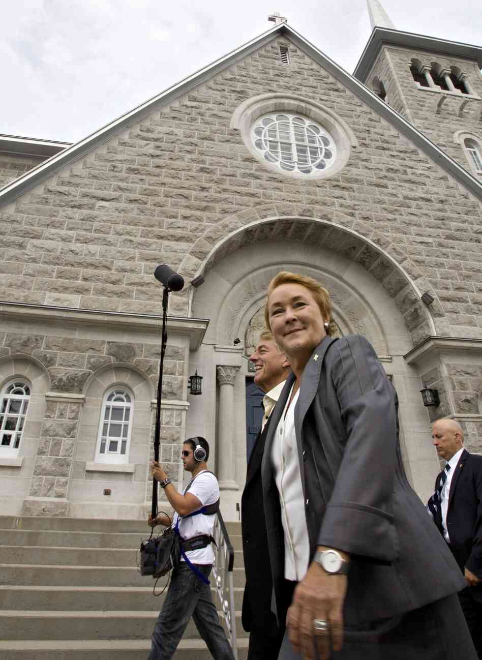 Pauline Marois and her husband in Quebec City, after casting their votes in Tuesday's provincial election.