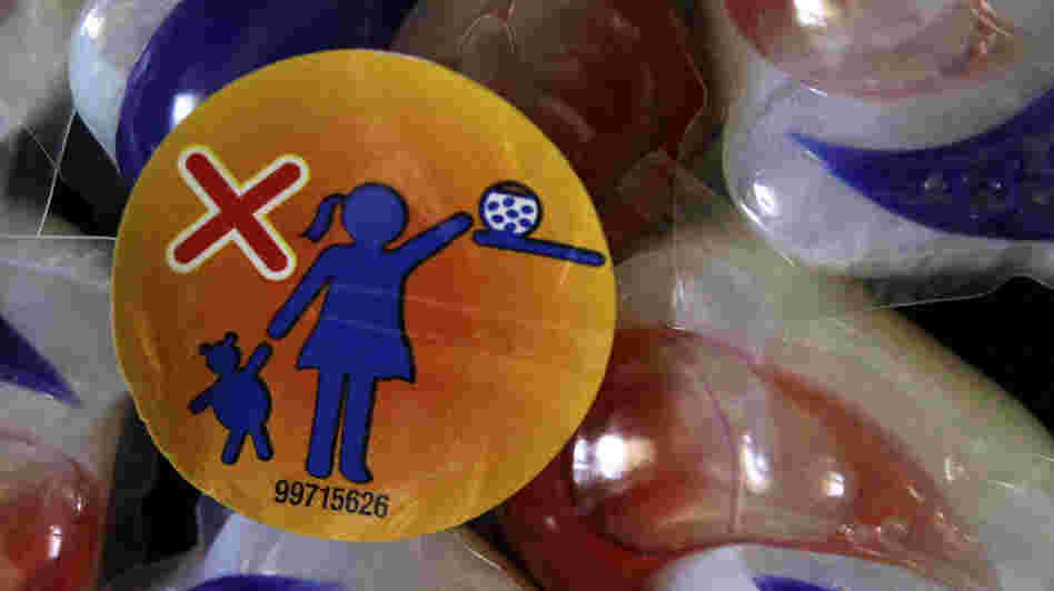 A label warns parents to keep Tide laundry detergent packets away from small children.