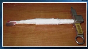 The toothbrush/space tool. The toothbrush/space tool.