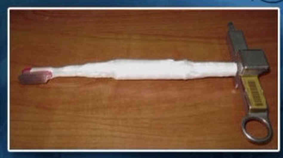 The toothbrush/space tool.