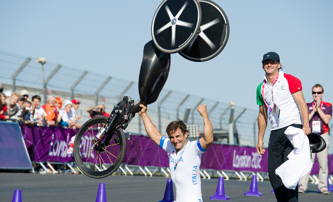 Alex Zanardi celebrates winning the gold medal in the men's individual H4 time trial cycling final at the London 2012 Paralympic Games at Brands Hatch circuit, in Kent, southern England. Zanardi's legs were amputated after a racecar crash in 2001.