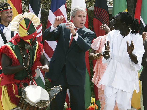 President George W. Bush dances with members of the KanKouran West African Dance Company during a Rose Garden event to mark Malaria Awareness Day at the White House on April 25, 2007. President George W. Bush dances with members of the KanKouran West African Dance Company during a Rose Garden event to mark Malaria Awareness Day at the White House on April 25, 2007.