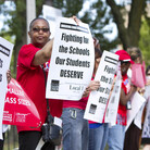 Members of the Chicago Teachers Union hold an informational picket outside Willa Cather Elementary School on Aug. 20 in Chicago. Teachers could go on strike Monday.