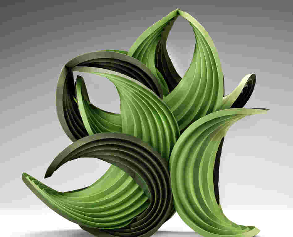 Green Balance is a 2011 work by Erik Demaine and his father, Martin Demaine. As a scientist, Erik Demaine says he works to "explore curved creased folding from both a mathematical and an artistic perspective."