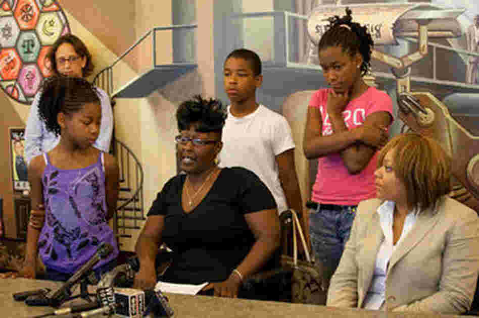 Michelle Johnson and her family talk about conditions within Detroit's Highland Park schools, in July. Michelle Johnson and her family talk about conditions within Detroit's Highland Park schools, in July.
