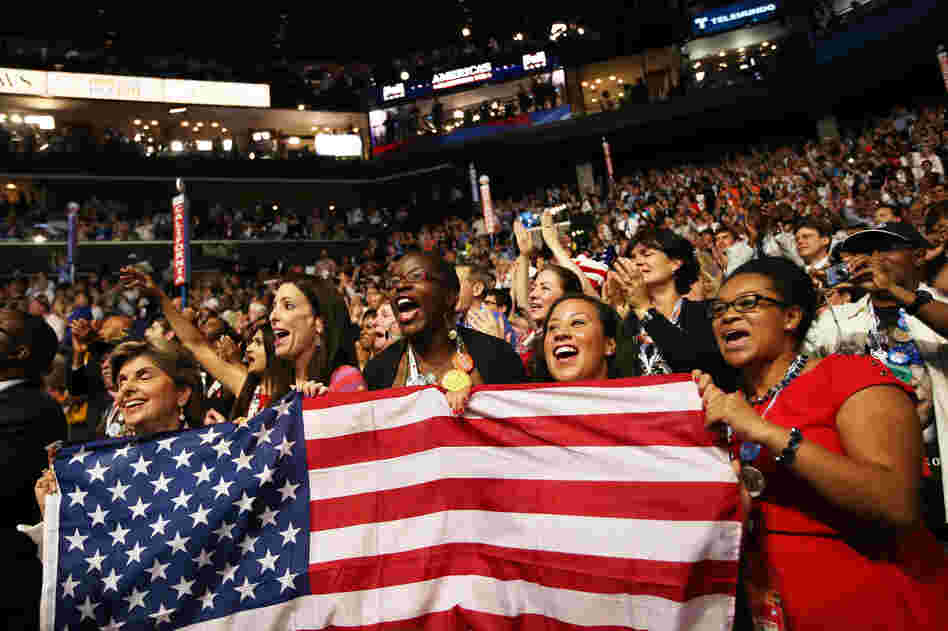 Attendees cheer during the convention. At times the arena became deafening.