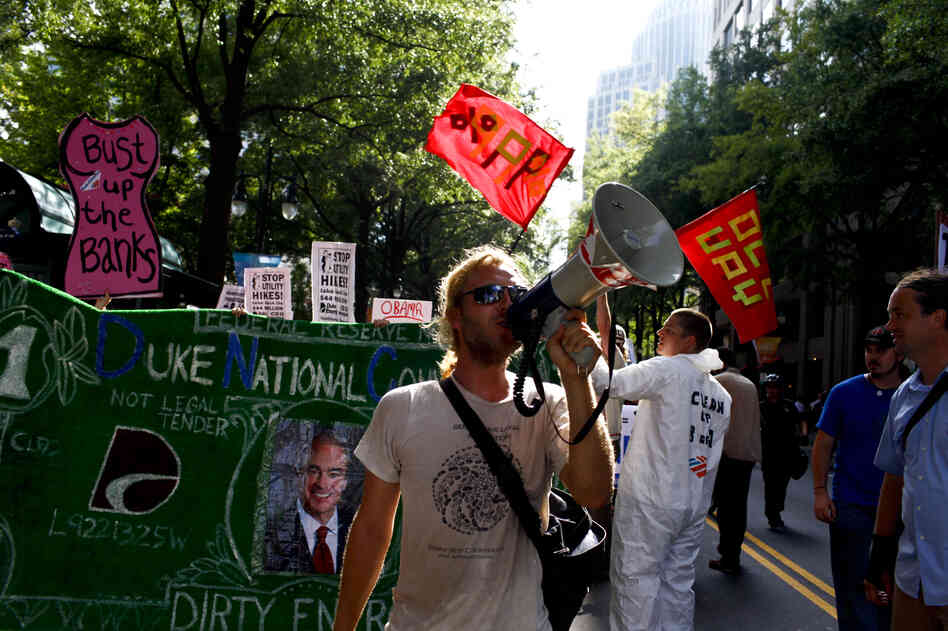 A group of roughly 100 Occupy protestors took to the streets in Charlotte on Wednesday. Occupiers marched relatively peacefully down Tryon St. a few blocks away from the Time Warner Cable Arena.