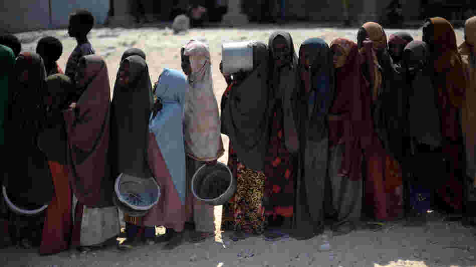Somali girls line up to receive a hot meal in Mogadishu last year after the worst drought in the Horn of Africa in decades, compounded by war, put millions in danger of starvation.