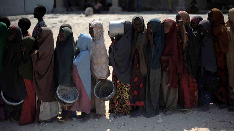 Somali girls line up to receive a hot meal in Mogadishu last year after the worst drought in the Horn of Africa in decades, compounded by war, put millions in danger of starvation.