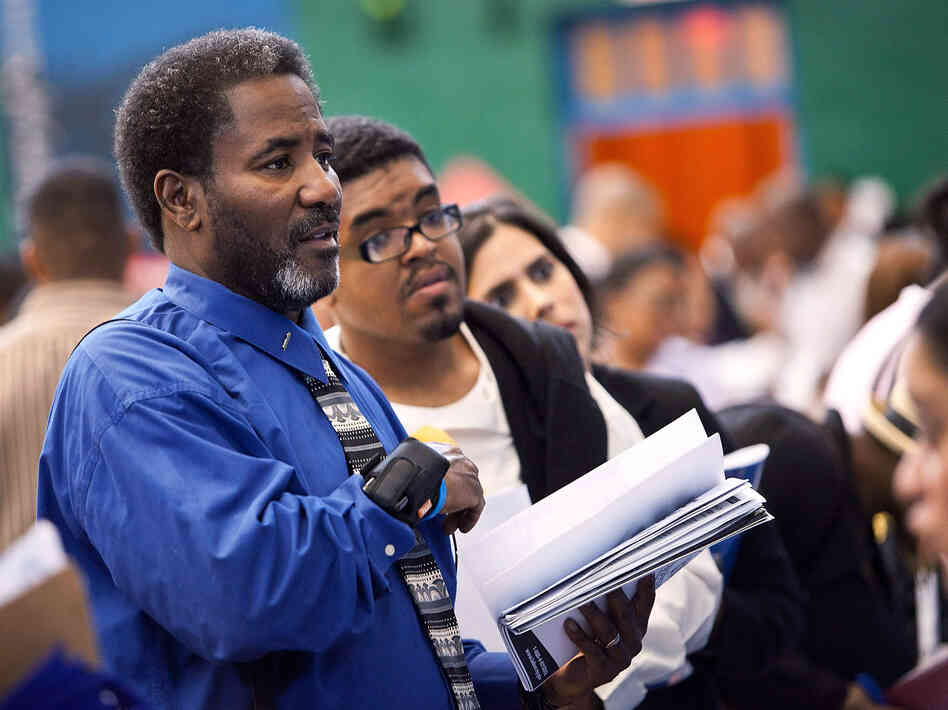 The scene at a job fair in Harlem earlier this summer.