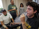Medical cannabis patient Michael Oliveri smokes marijuana during a news conference in Universal City, Calif., last week. Medical marijuana advocates say they have enough signatures to place a referendum before voters that would overturn a ban on pot clinics in Los Angeles. Medical cannabis patient Michael Oliveri smokes marijuana during a news conference in Universal City, Calif., last week. Medical marijuana advocates say they have enough signatures to place a referendum before voters that would overturn a ban on pot clinics in Los Angeles.