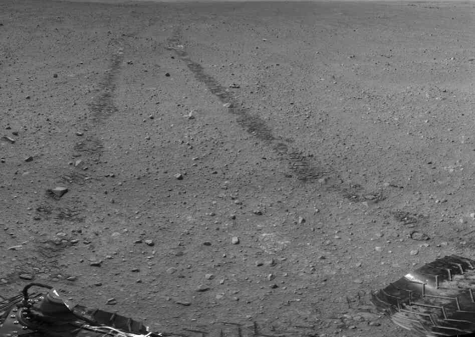 Curiosity's tracks on Mars, in an image taken from the rover.
