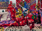 Knitting Is for Pus**** is a work by crochet sculptor Olek. He has created an entire apartment blanketed in brightly colored, crocheted camouflage. Knitting Is for Pus**** is a work by crochet sculptor Olek. He has created an entire apartment blanketed in brightly colored, crocheted camouflage.