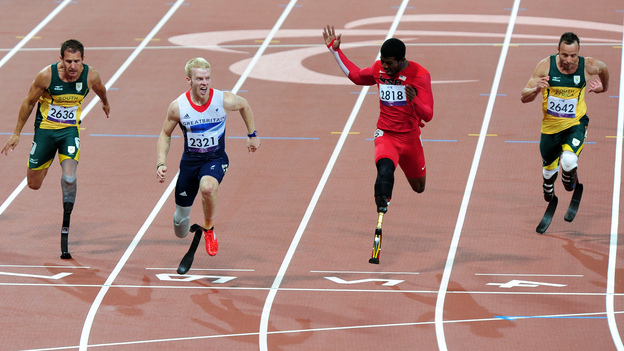 Bronze medalist Arnu Fourie of South Africa (from left), gold medalist Jonnie Peacock of Great Britain, silver medalist Richard Browne of the United States and Oscar Pistorius of South Africa cross the line in the Men's 100m - T44 Final at London's Olympic Stadium.