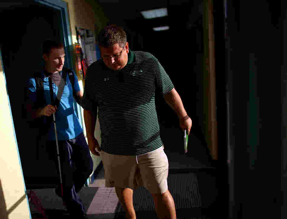A native of St. Petersburg, Fla., Snyder was captain of the swim team at the U.S. Naval Academy, where he graduated in 2006. Here, he walks with his coach at his training center in Baltimore.
