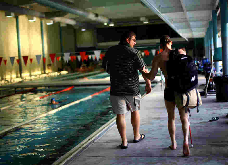 Synder and Loeffler head to the showers after training.