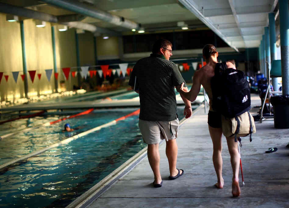 Synder and Loeffler head to the showers after training.