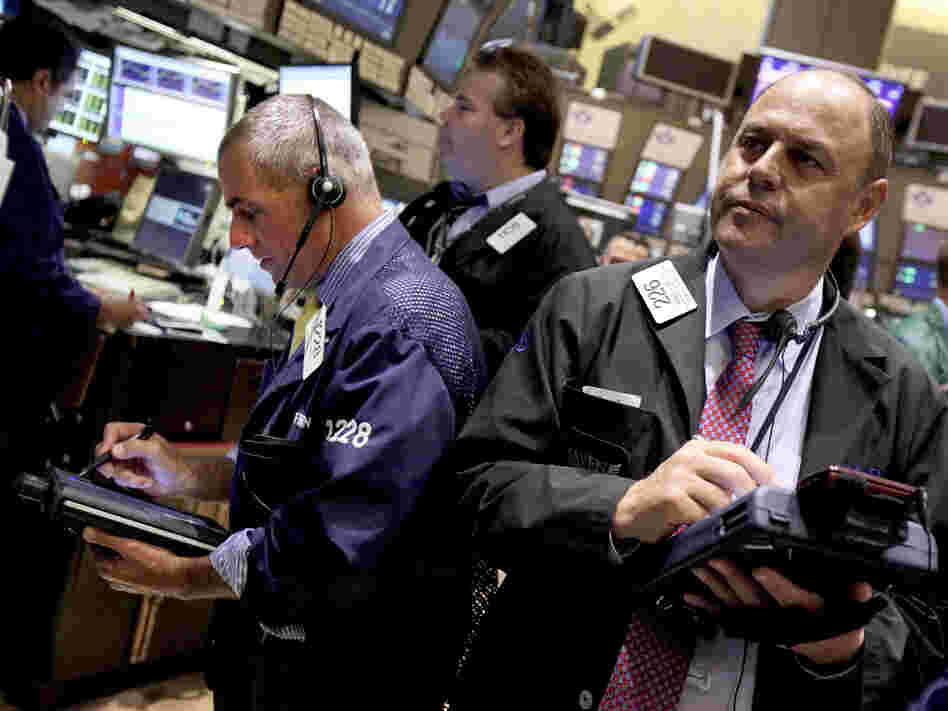 Traders on the floor of the New York Stock Exchange on Aug. 9. Economic developments on both sides of the Atlantic could have a big impact on the U.S. presidential election.