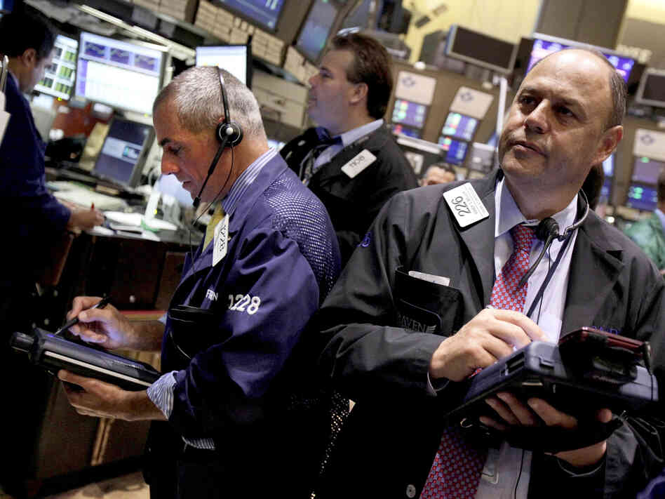 Traders on the floor of the New York Stock Exchange on Aug. 9. Economic developments on both sides of the Atlantic could have a big impact on the U.S. presidential election.