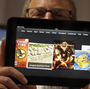 Amazon Kindle vice president Peter Larsen holds the Kindle Fire HD at the introduction of the new tablet in Santa Monica, Calif., on Thursday.