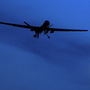 A U.S. Predator drone flies through the night sky over Kandahar Air Field in Afghanistan. Such drones have been targeting groups such as the Haqqani network that are accused of attacking U.S. and Afghan forces.