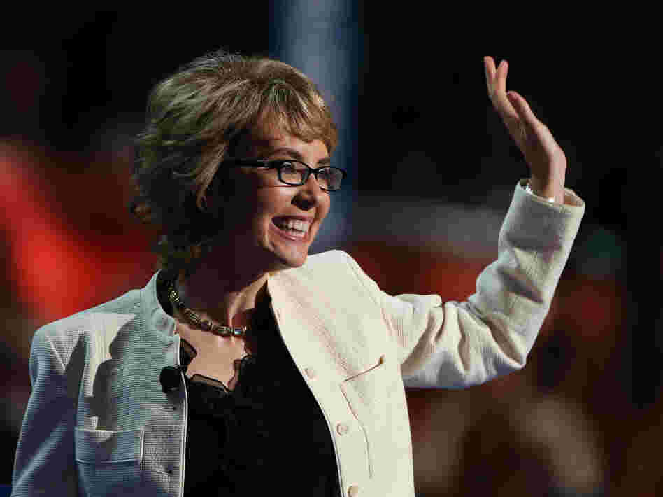 Former Rep. Gabrielle Giffords, D-Ariz., waves to the delegates at the Democratic National Convention.
