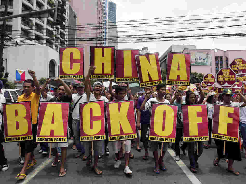 Protesters in Manila, Philippines, marched toward the Chinese consulate during a May rally decrying the standoff between the two nations over the Scarborough Shoal.