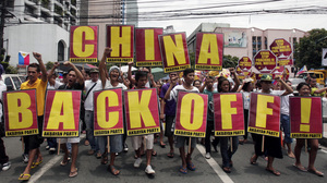 Protesters in Manila, Philippines, marched toward the Chinese consulate during a May rally decrying the standoff between the two nations over the Scarborough Shoal.