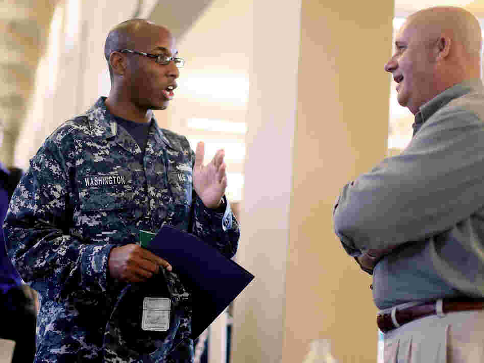 At a job fair in San Diego this week, Navy Sailor E-5 Cedric Washington spoke to Sim Garriotti from Lockheed Martin while interviewing for a potential position.