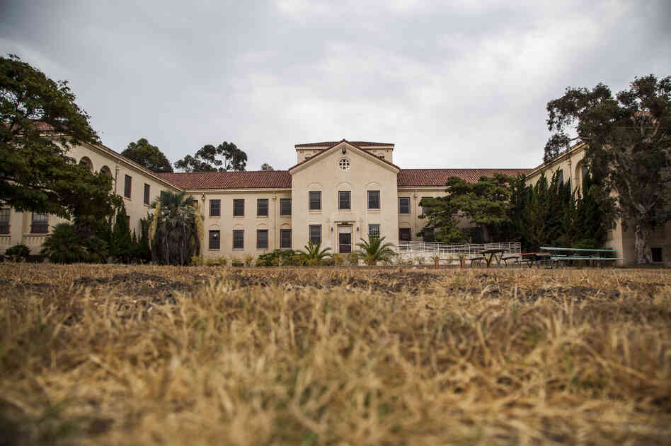 The 388-acre campus of the Veterans Affairs Medical Center in West Los Angeles was donated to the federal government more than 100 years ago for use as a home for disabled veterans, but is no longer used for that purpose. In 2007, Building 209, pictured here, was designated as a place to house disabled homeless vets. It is currently abandoned.