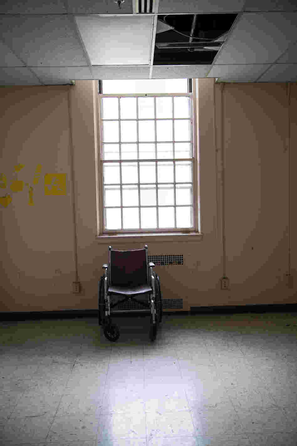 An empty room is seen inside Building 209. Although the building is supposed to house disabled vets, it is currently vacant and uninhabitable.
