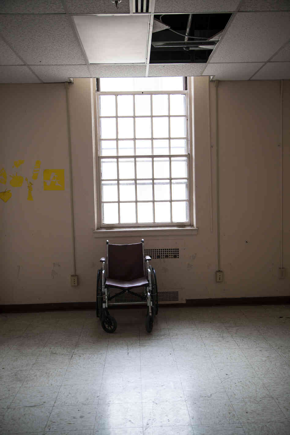 An empty room is seen inside Building 209. Although the building is supposed to house disabled vets, it is currently vacant and uninhabitable.