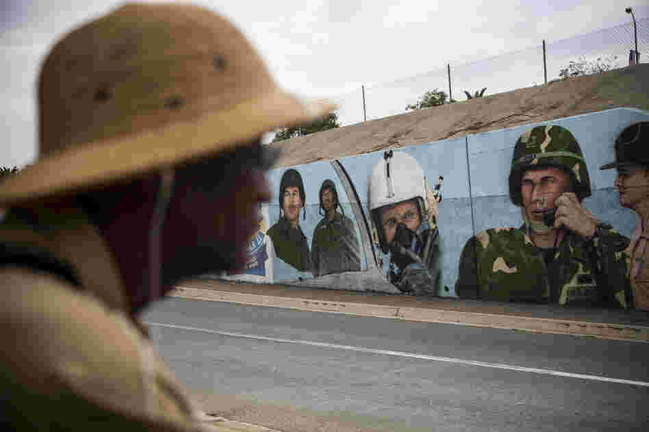 R.W. Williams, 63, a Vietnam veteran, has been seeking medical treatment for a host of ailments, including PTSD, at the VA health center in Los Angeles. He is seen here on the campus near a mural honoring soldiers.