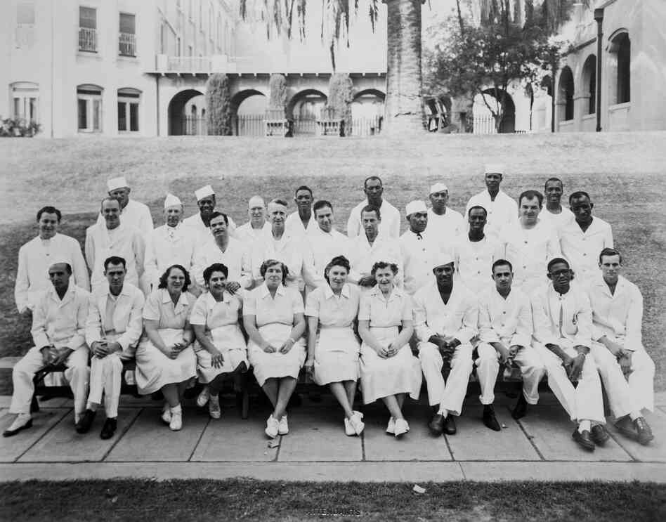 An image of attendants, circa 1949.