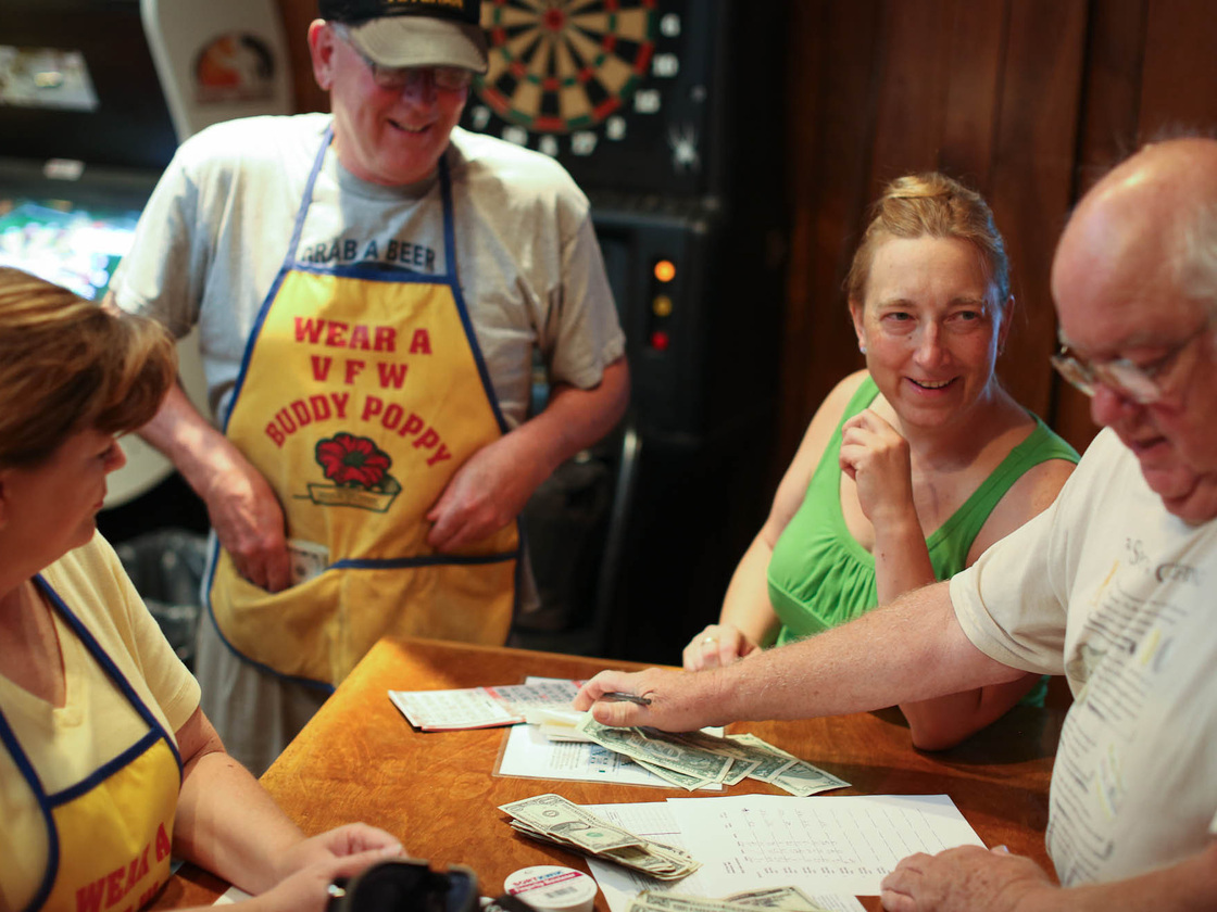 From left, Linda Ausen, Marvin Jansma, Diane Sandberg and David Griffith volunteer during bingo night in July at the VFW post in Rosemount, Minn.
