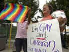 Carri Jo Anderson joins the protest in front of a Chick-fil-A restaurant in Pompano Beach, Fla., in August. As views on homosexuality change, more states are challenging the federal definition of marriage
