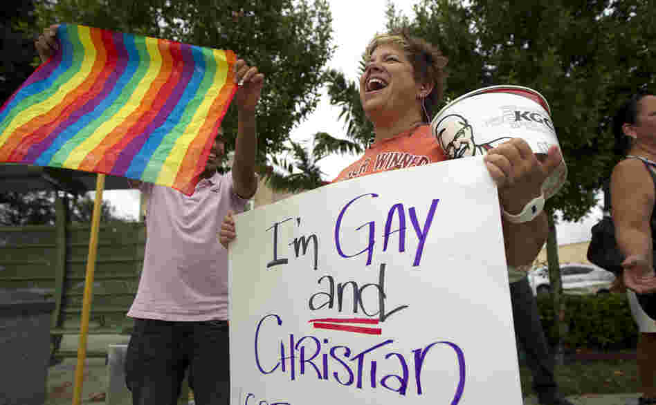 Carri Jo Anderson joins the protest in front of a Chick-fil-A restaurant in Pompano Beach, Fla., in August. As views on homosexuality change, more states are challenging the federal definition of marriage