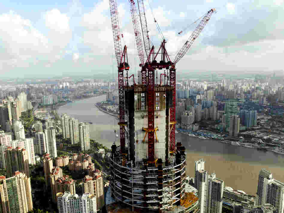 China's growing economic might means that it has increasing power to push back against US policies that it does not like, according to analysts. This photo from August shows the construction on the Shanghai Tower, which will be the tallest building in Shanghai.