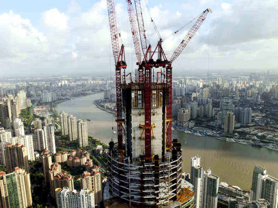 China's growing economic might means that it has increasing power to push back against US policies that it does not like, according to analysts. This photo from August shows the construction on the Shanghai Tower, which will be the tallest building in Shanghai.